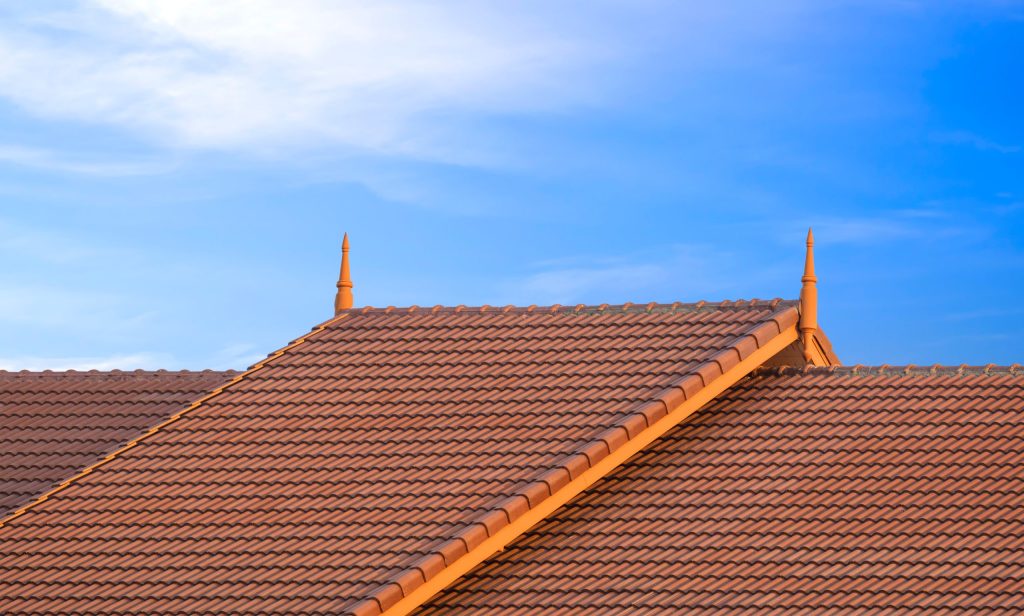 Brown tiled roof with decorative finials